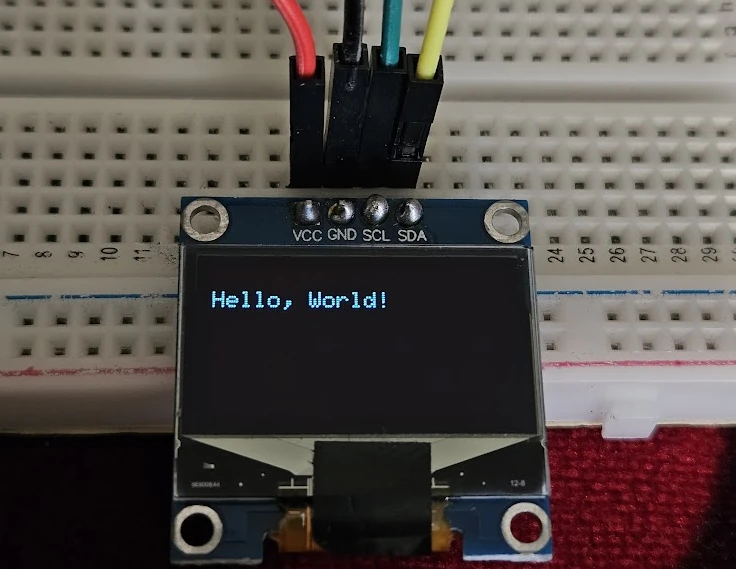 0.96" SSD1306 Oled display showing the text printed on it.
