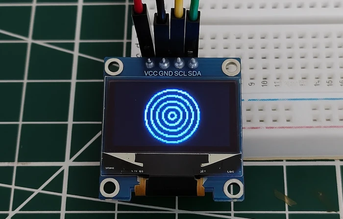 Image showing the concentric circles are printed on the 0.96" SSD1306 oled display, which is connected to TM4C123G via the I2C.