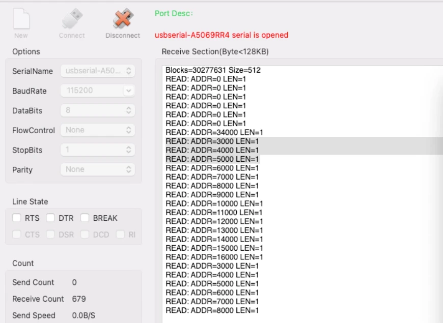 Serial console showing STORAGE_GetCapacity log followed by multiple READ block address logs as the OS scans the SD card file system